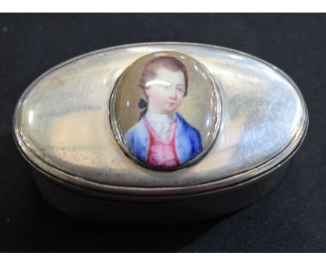 A George III silver oval snuff box, the push-fitting cover applied with an enamel portrait of a gentleman, 6.5cm wide, maker 