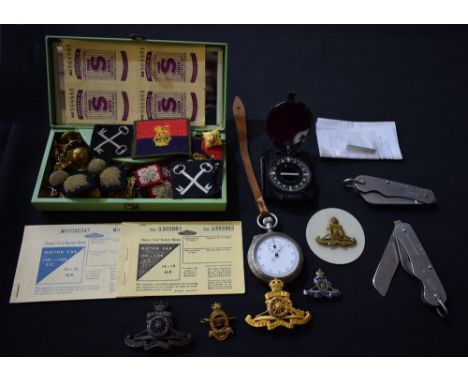 Militaria - cap badges and buttons; stop watch; two Warriss of Sheffield military issue pocket knives; compass, etc