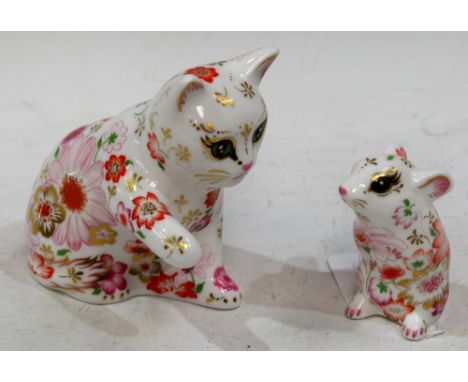 A Royal Crown Derby paperweight, Flora Kitten, Collector's Guild Exclusive, gold stopper, boxed; another similar, Dora Mouse,