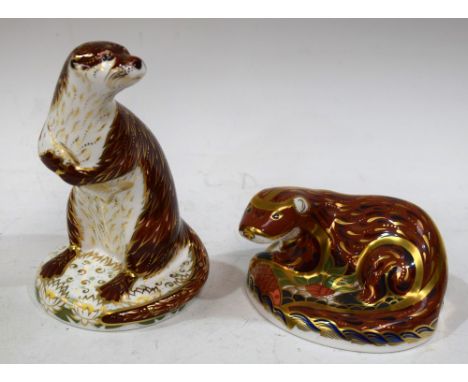 A Royal Crown Derby paperweight, Playful Otter, gold stopper, boxed; another, Otter, gold stopper, boxed (2) Condition Report