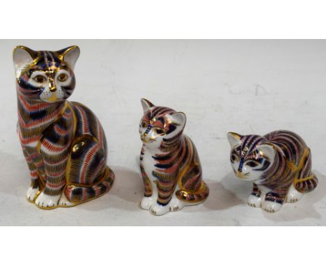 A Royal Crown Derby paperweight, Cat, gold stopper, boxed; others, Sitting Kitten, gold stopper, boxed; Kitten Sitting, gold 