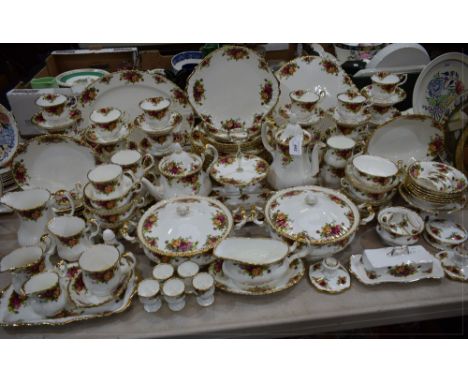 An extensive Royal Albert Old Country Roses pattern dinner and tea service, including oval meat platter, two tureens and cove