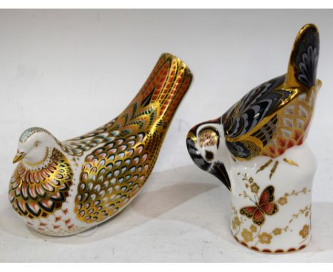 A Royal Crown Derby paperweight, Turtle Dove, gold stopper, boxed; another, Great Spotted Wood Pecker, gold stopper, boxed (2