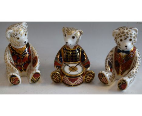 A Royal Crown Derby paperweight, Drummer Bear, gold stopper; others, Debonair Bear, gold stopper; Teddy Bear Blue Bow tie, go