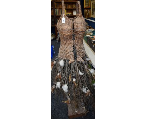 An unusual naturalistic woven and twig torso figure of a lady, trunk column, rectangular base, approx 160cm high