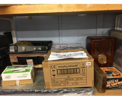 Shelf of assorted including Deco style radio, stylophone etc.