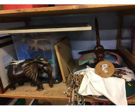 Shelf of assorted including lace making items, elephant etc