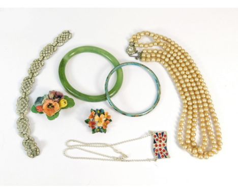 COSTUME JEWELLERY. Including an enamelled bangle, a celluloid simulated jade bangle etc.  Note that all items in this auction