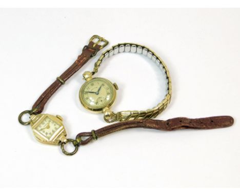 GOLD WATCHES. A lady's 9ct. gold cased Rotary wristwatch (lacks sweep seconds hand) on gold plated bracelet strap. Also, a 14