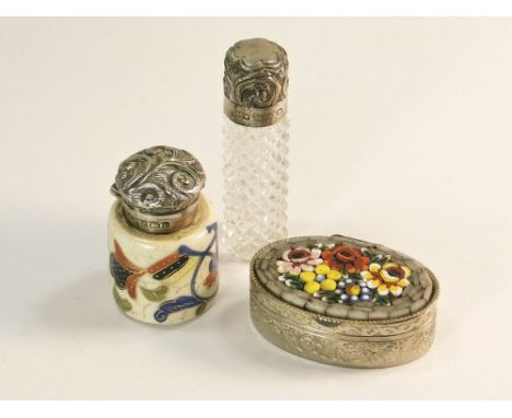 SCENT BOTTLES ETC. A Victorian silver mounted, screw top, cut glass scent bottle & an Edwardian silver mounted hand decorated
