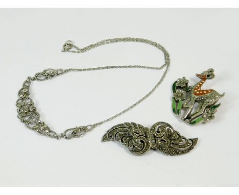 MARCASITE. A marcasite double dress clip/brooch, a marcasite set necklace & a marcasite & cold painted enamel fawn brooch.  N