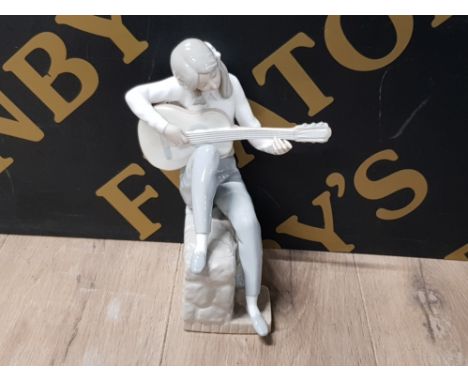 NAO BY LLADRO FIGURE OF A GIRL SITTING PLAYING A GUITAR 25CM