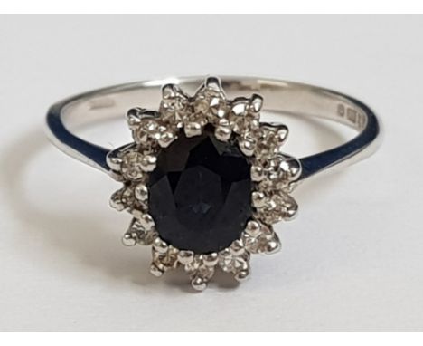 9CT WHITE GOLD DIAMOND AND SAPPHIRE CLUSTER RING, 1.7G SIZE I 1/2