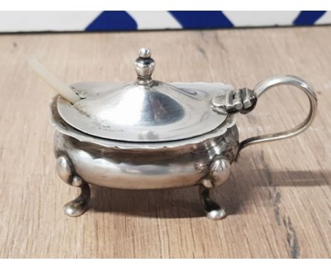 SILVER CONDIMENT ON PAW FEET WITH ORIGINAL BLUE GLASS LINER AND MOTHER OF PEARL SPOON