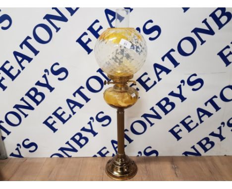TALL OIL LAMP ON REEDED BRASS STEM WITH BOTH SHADES PRESENT