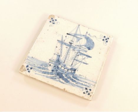 DELFT TILE. A hand decorated Delft tile. 12cm. Provenance: Jennie &amp; Arthur Hancox.