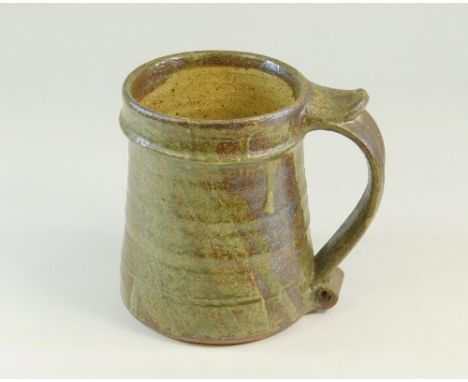 LEACH STANDARD WARE A Leach Pottery pint mug . Pottery mark &amp; base marked 'Ash Glaze'.