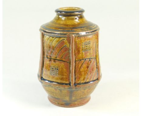 MIKE DODD. A vase with incised &amp; impressed decorated panels. Impressed mark. Height 18cm.