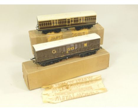 METALMODELS. Two 'Metalmodels' 40ft. vans with boxes. A GWR luggage/brake van &amp; a GWR ventilated van. Condition &amp; pai