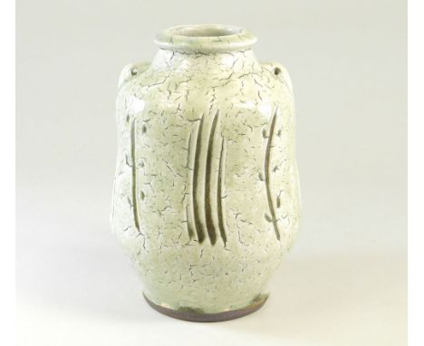 MIKE DODD. A vase with lug handles &amp; incised decoration. Impressed mark. Height 17.5cm.