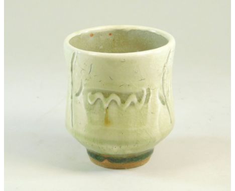 MIKE DODD. A yunomi with incised decoration. Impressed mark. Height 9.5cm.