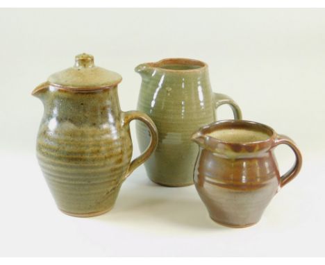 LEACH STANDARD WARE Two Leach Pottery two pint coffee pots, (one lacks lid) &amp; a pint jug (af). All marked.