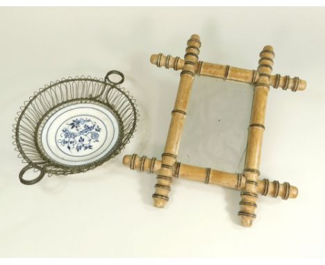 MIRROR ETC.A wall mirror in faux bamboo Oxford frame, 32 x 37cm & a French ceramic plate in wire work frame.