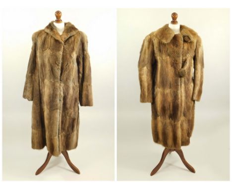 FUR COAT ETC. A fur coat with shawl collar &amp; one other fur coat with large single button.