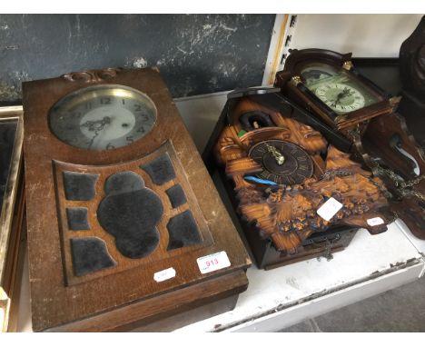 TWO WALL CLOCKS AND A CUCKOO CLOCK
