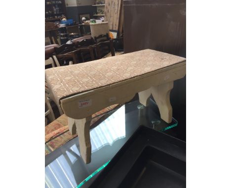 AN OLD STOOL