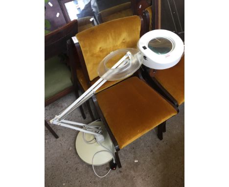 AN ANGLE POISE MAGNIFYING LAMP