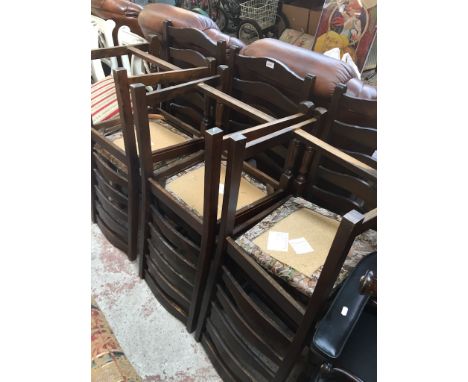 A SET OF 6 OAK LADDER BACK CHAIRS