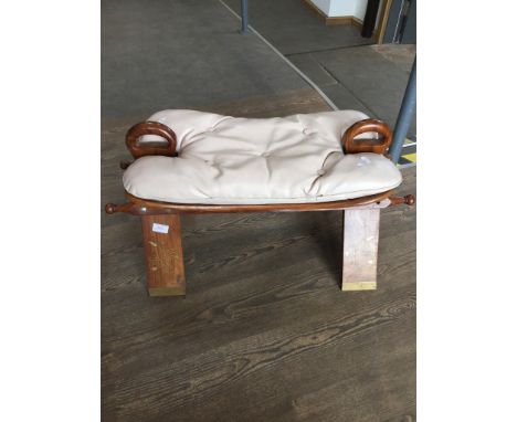 A CAMEL STOOL