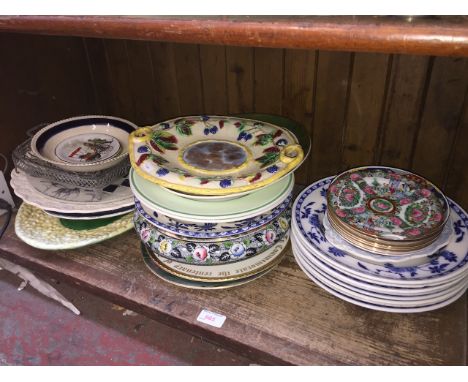 SHELF OF POTTERY PLATES ETC