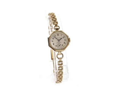 LADY'S ROLEX  NINE CARAT GOLD MANUAL WIND WRIST WATCH
signed Rolex Prima 15 jewel movement, the round buff dial with Arabic n