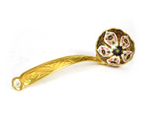 A Royal Crown Derby 'Old Imari' solid gold band soup ladle, pattern 1128, gilt printed mark to base within design, 30cms.