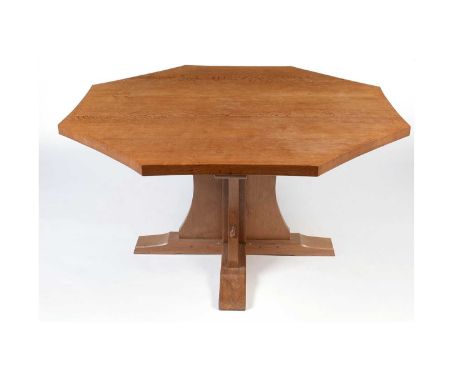 Workshop of Robert ‘Mouseman’ Thompson (Kilburn): an oak 4’6’’ octagonal dining table, the adzed top on a cruciform base, wit