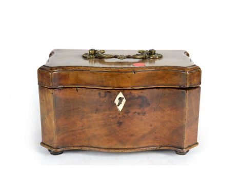 A George III mahogany tea caddy, of serpentine form with gilt brass leaf and shell handle and bone escutcheon, no interior, r