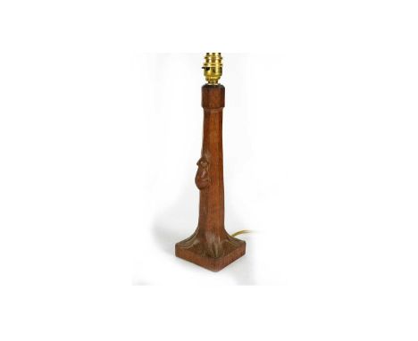 Workshop of Robert ‘Mouseman’ Thompson, Kilburn: an oak table lamp, with carved mouse signature, 36cms high to fitting, with 