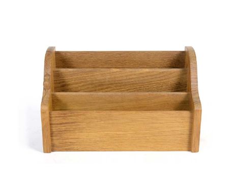 Workshop of Robert ‘Mouseman’ Thompson (Kilburn): an oak stationery/letter rack, with carved mouse trademark, 33 x 13 x 21cms