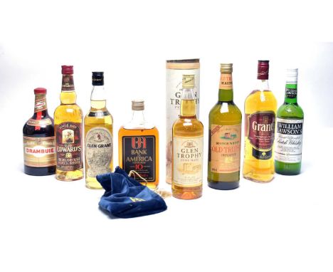 Seven bottles of whisky, including: Glen Grant, Glen Trophy Special Reserve, Grant's, Glen Edward's and others; and a bottle 