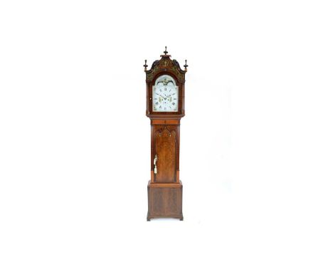 T. Gaskell, Knutsford: an ornate mahogany and satinwood banded longcase clock, the painted roman dial with foliate spandrels,