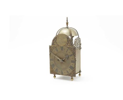 A brass lantern wall clock with passing strike, four posted case with pierced frets, single fusee movement with an anchor esc