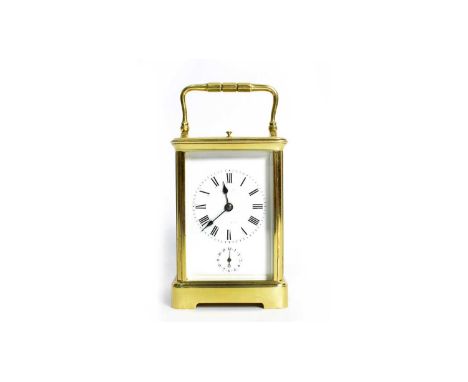 R. & C. (probably Richard & Cie): a late 19th Century gilt brass repeating carriage alarm clock, with enamelled roman dial an