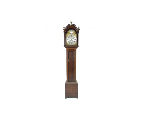 John Watson, Kirbymoorside: an oak and mahogany banded longcase clock, the brass dial with ornate silvered roman chapter ring