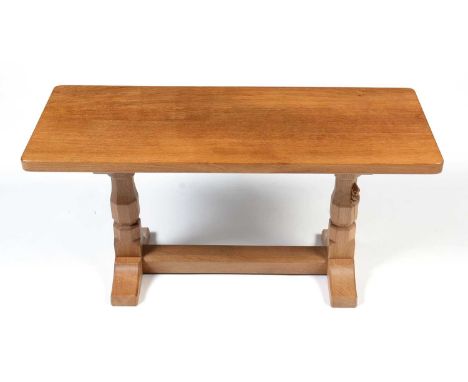 Workshop of Robert ‘Mouseman’ Thompson (Kilburn): an oak refectory coffee table, the rectangular adzed top raised on octagona