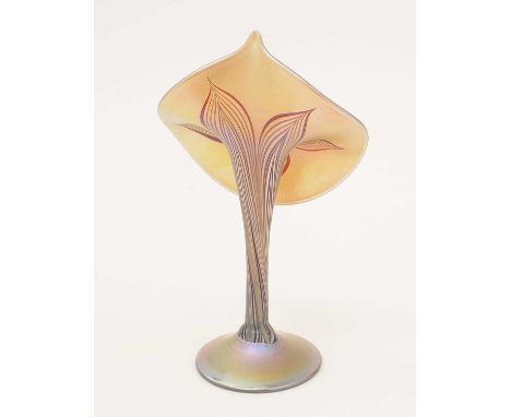 In the manner of Louis Comfort Tiffany (1848-1933): Jack-in-the-Pulpit, an Art Nouveau style iridescent glass vase, in the fo