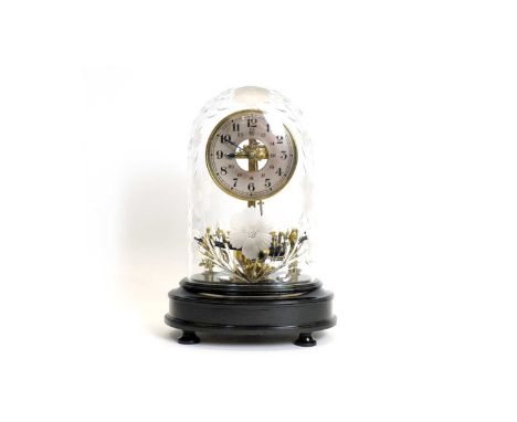 Bulle Patent: an electric clock, with silvered arabic dial, associated glass cover and ebonised base, 38cms high.From the Les