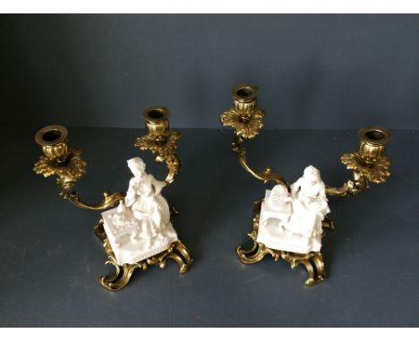 Pair of fine quality ormolu twin branch candelabra, each supporting a Parian figure group, each of a Victorian seated lady, t
