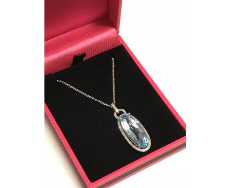 9 carat white gold substantial aquamarine & diamond pendant necklace on a gold chain